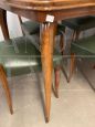 Mid-century living room set with table with glass top and green skai chairs