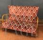 Art Deco style small sofa in wood and damask fabric