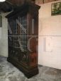 Large 1950s walnut bookcase with leaded glass doors