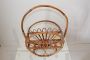 Round bamboo magazine rack from the 1960s