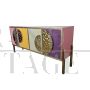 Four-door sideboard in colored glass and brass