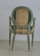 Pair of Louis Philippe style upholstered and green and gold lacquered armchairs