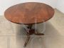 Antique Directoire round table from the early 19th century in solid walnut                            