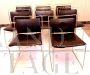 Set of 4 Tulu chairs by Kazuhide Takahama in black leather
