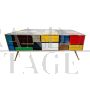 Large coffee table in multicolored glass with drawers