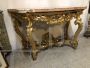 Roman Louis XV console in carved and gilded wood