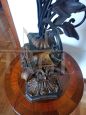 Antique style wooden table lamp with floral pattern in iron and sheet metal