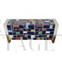 Multicolored glass sideboard with shaped golden handles