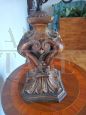 Antique style wooden table lamp with floral pattern in iron and sheet metal