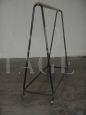 Vintage industrial stander clothes hanger with wheels from the 1950s