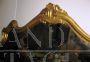 Vintage gilded mirror in imitation gold