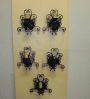 Set of five vintage wrought iron wall lights
