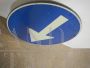 Vintage mandatory direction road sign, Italy 1995