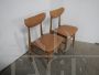 Pair of vintage chairs in beech and brown imitation leather, 1950s