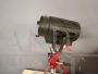 Small vintage cinema spotlight with tripod
