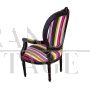 Pair of antique style armchairs with multicolored fabric