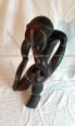 African ethnic sculpture with figure in black stained teak wood
