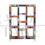 Open bookcase in wood covered in colored glass