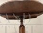 Antique Directoire round table from the early 19th century in solid walnut