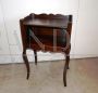 Small vintage bedside table in classic style with open compartment