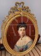 Antique painting portrait of a lady from the 9th century in a gilded frame