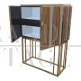 Double-sided center bar cabinet covered with colored mirrors