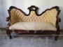 Antique Louis Philippe 2-seater sofa with curved capitonné backrest