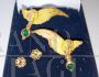 Pair of vintage earrings with angels in gold and emeralds