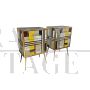 Pair of bedside tables in colored glass with geometric designs
