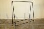 Vintage industrial stander clothes hanger with wheels from the 1950s