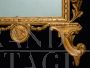Antique Louis XV style mirror in gilded and carved wood, Tuscany early 1900s