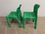 Pair of green chairs designed by Carlo Bartoli for Kartell, space age from the 70s