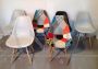 Set of 8 Charles Eames style chairs in various colours
