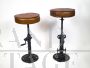 Pair of cast iron bar stools with spring closure