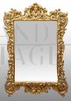 Antique Louis XV style mirror in gilded and carved wood