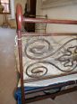 Antique single bed in wrought iron