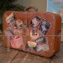 Vintage Leather Suitcase with Travel Stickers