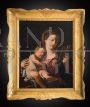 Antique oil painting on canvas depicting Madonna with sleeping child