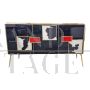 3-door sideboard in black glass and black and white pony skin        