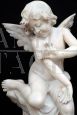 Antique Napoleon III alabaster sculpture depicting a winged cherub