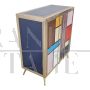 Small two-door bar cabinet sideboard covered in colored glass