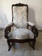 Antique Louis Philippe sculpted and carved rocking armchair