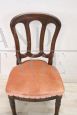 Antique single chair from the 19th century covered in peach colored velvet