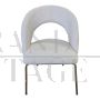 Design chair in white bouclé fabric