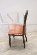 Antique single chair from the 19th century covered in peach colored velvet