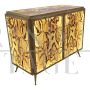 Illuminated glass sideboard with bark pattern