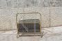 Magazine rack in brass and black lacquered metal, Italy 1970s