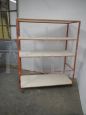 Industrial wood and orange metal shelf trolley, 1970s
                            