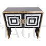 Black and white glass bar cabinet with mirror interior