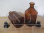 Pair of vintage glass apothecary bottles with stopper